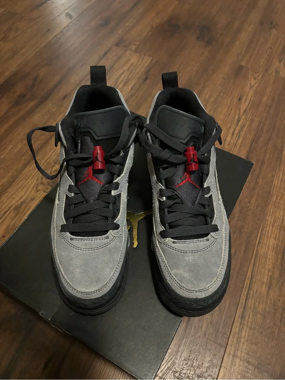 Jordan Grey and Black Sneakers with Red Jumpman Accents